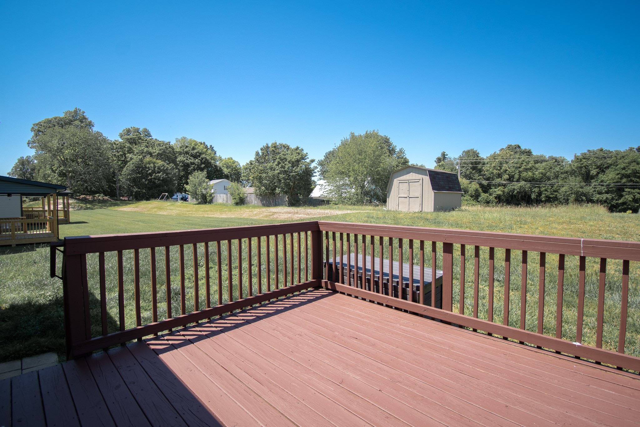 626 Avondale Road Oak Grove, KY 42262 - Photo 12 of 14 a balcony with wooden floor and city view