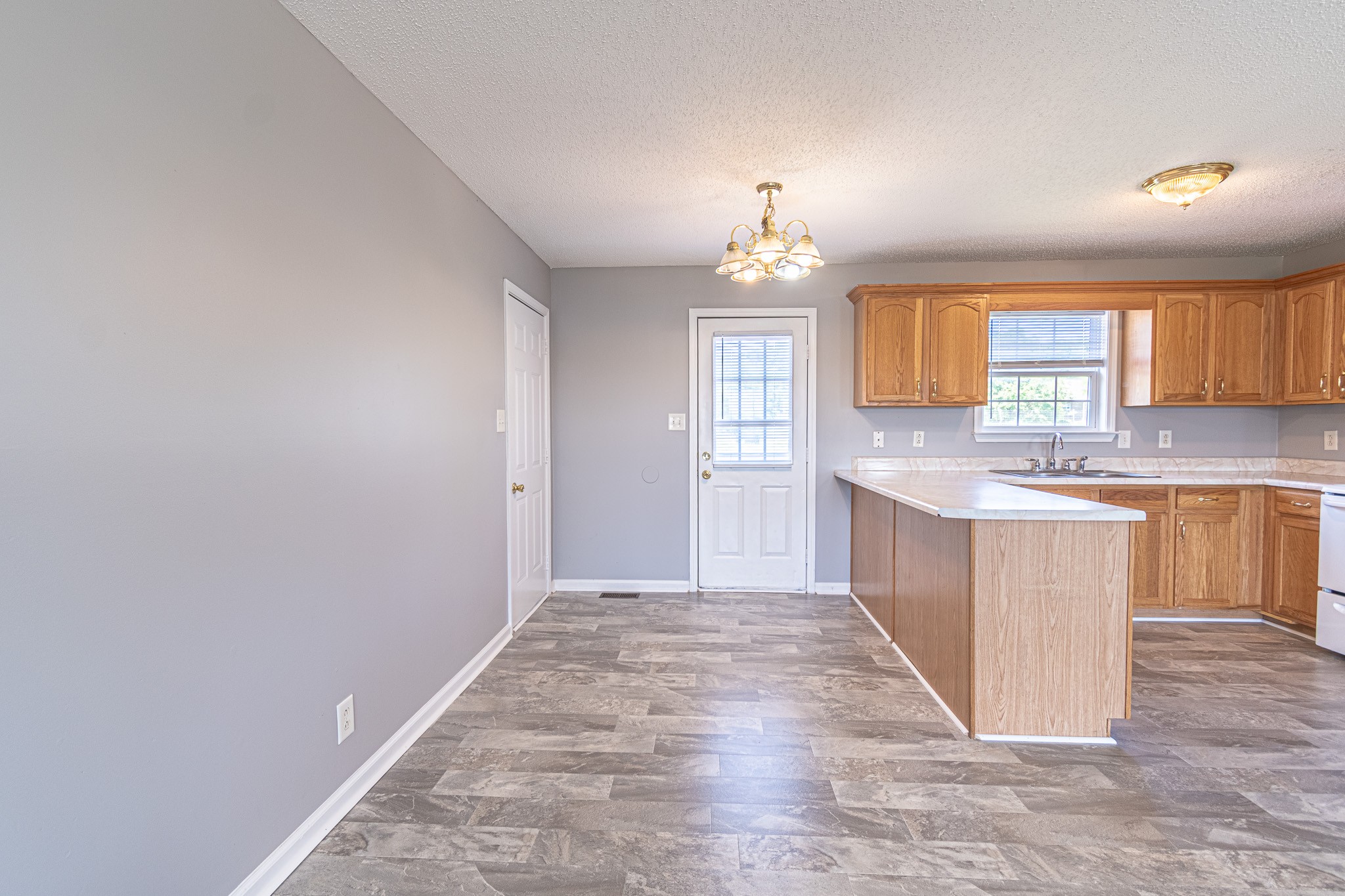 626 Avondale Road Oak Grove, KY 42262 - Photo 5 of 14 a view of a kitchen with a sink and a window