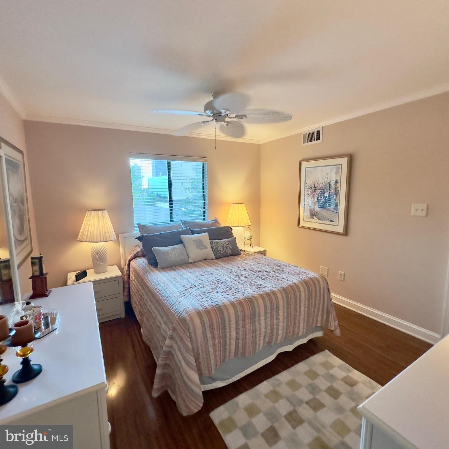 119 Old Landing Road, Unit E203 Ocean City, MD 21842 - Photo 21 of 45 a bedroom with a bed and window