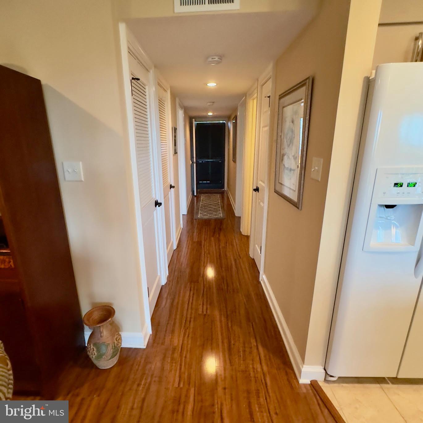 119 Old Landing Road, Unit E203 Ocean City, MD 21842 - Photo 30 of 45 a view of entryway with wooden floor
