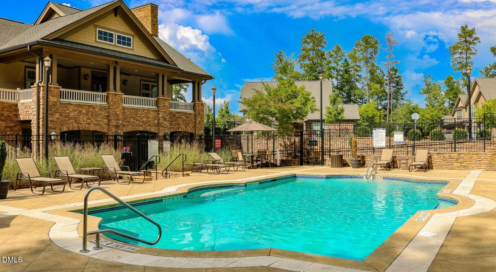 100 Ginkgo Trail, Unit ROSEMARY Chapel Hill, NC 27516 - Photo 2 of 49 a view of a house with swimming pool