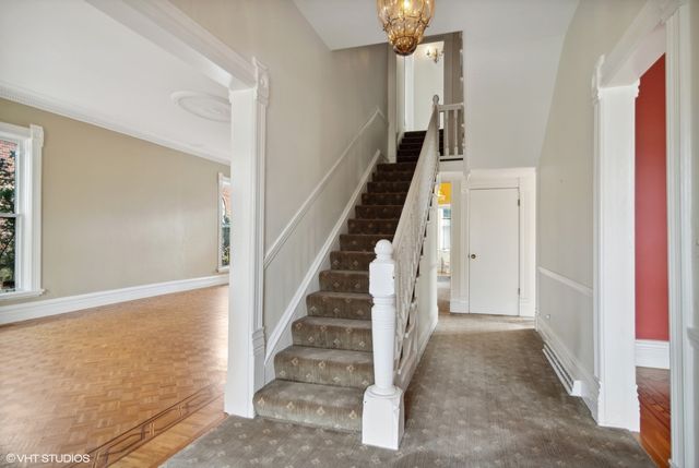 a view of an entryway with staircase