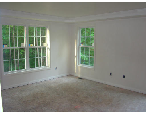 35 Little Turnpike Road Shirley, MA 01464 - Photo 13 of 22 a view of an empty room with a window