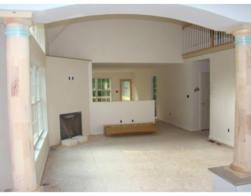 35 Little Turnpike Road Shirley, MA 01464 - Photo 9 of 22 a view of an empty room with a fireplace