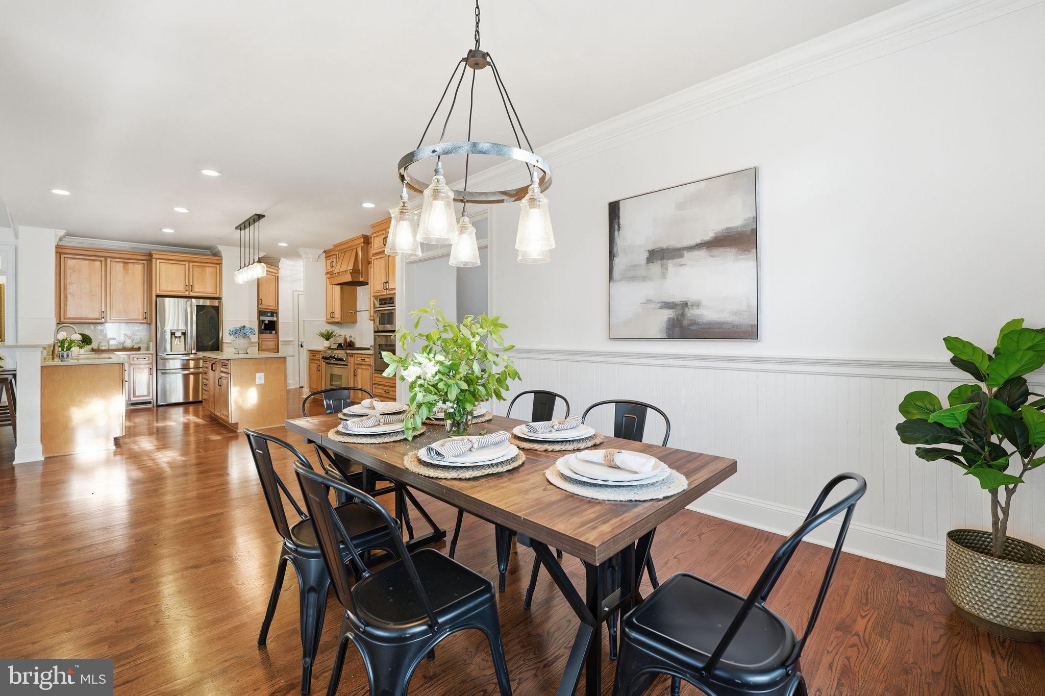 10916 Chatham Ridge Way Spotsylvania, VA 22551 - Photo 19 of 92 Charming dining space with modern flair.