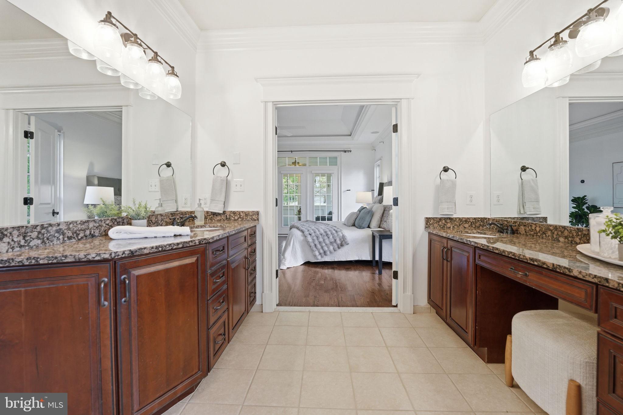 10916 Chatham Ridge Way Spotsylvania, VA 22551 - Photo 27 of 92 Elegant dual-sink bathroom retreat.