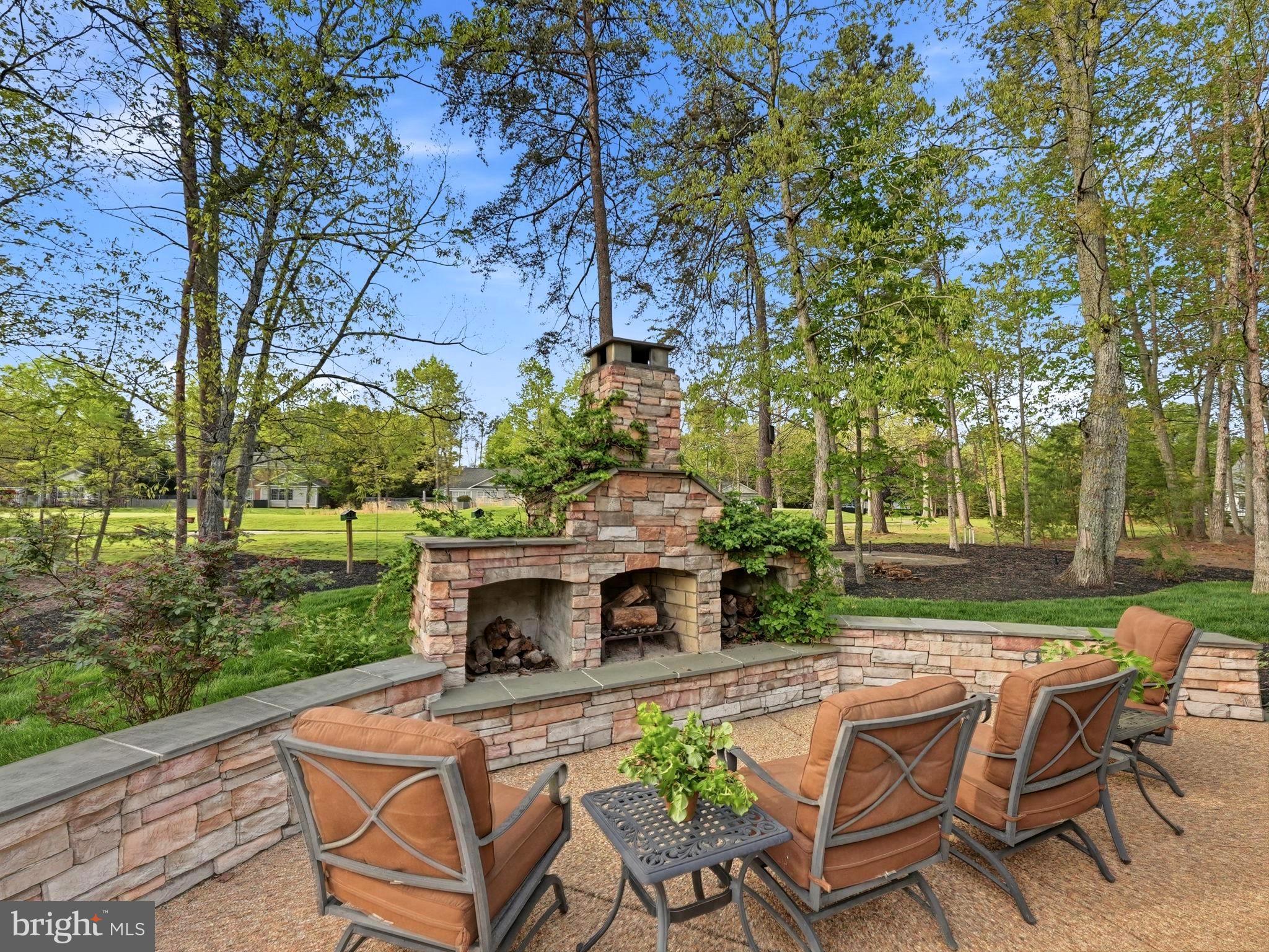10916 Chatham Ridge Way Spotsylvania, VA 22551 - Photo 34 of 92 Charming outdoor retreat with fireplace.