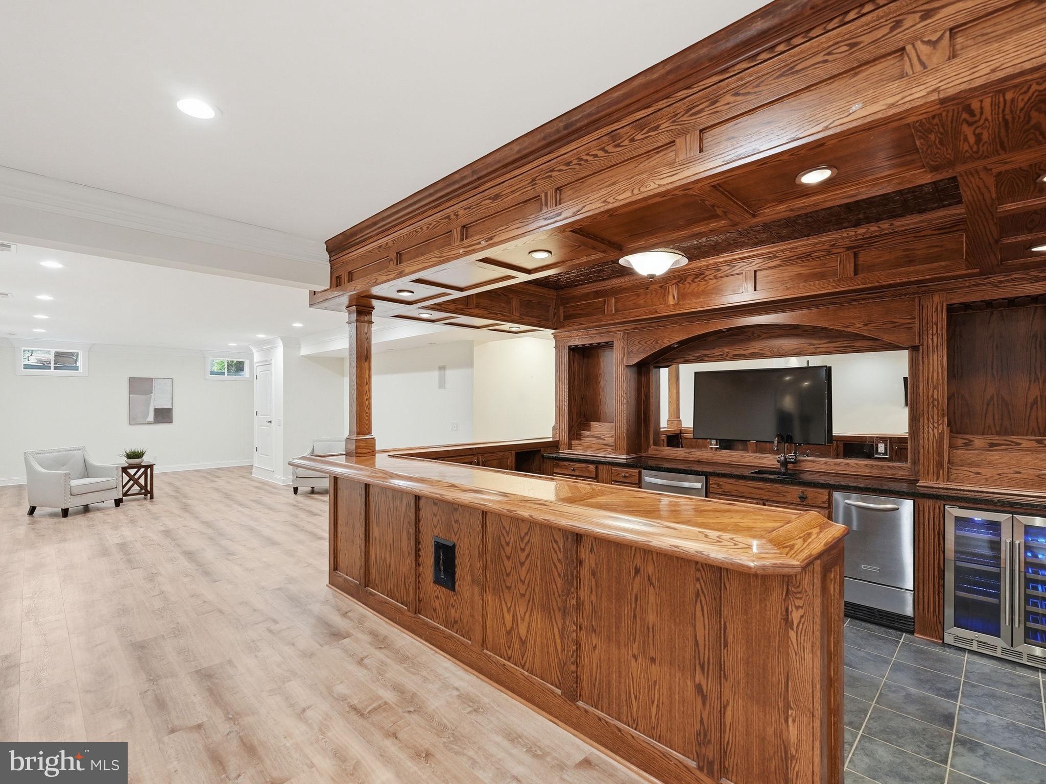 10916 Chatham Ridge Way Spotsylvania, VA 22551 - Photo 46 of 92 Elegant wood-accented entertainment space.