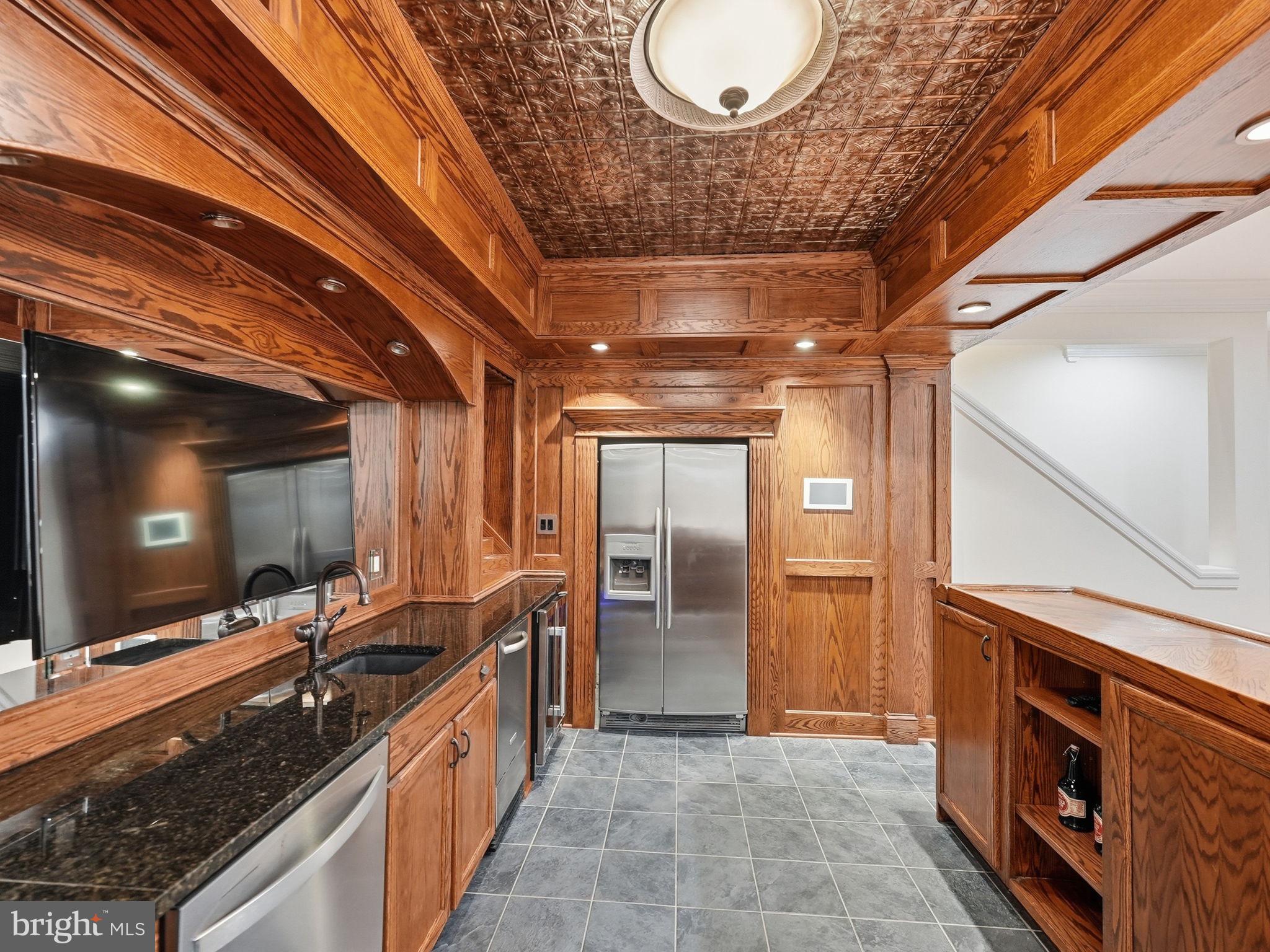 10916 Chatham Ridge Way Spotsylvania, VA 22551 - Photo 48 of 92 Elegant wood-accented kitchen space.