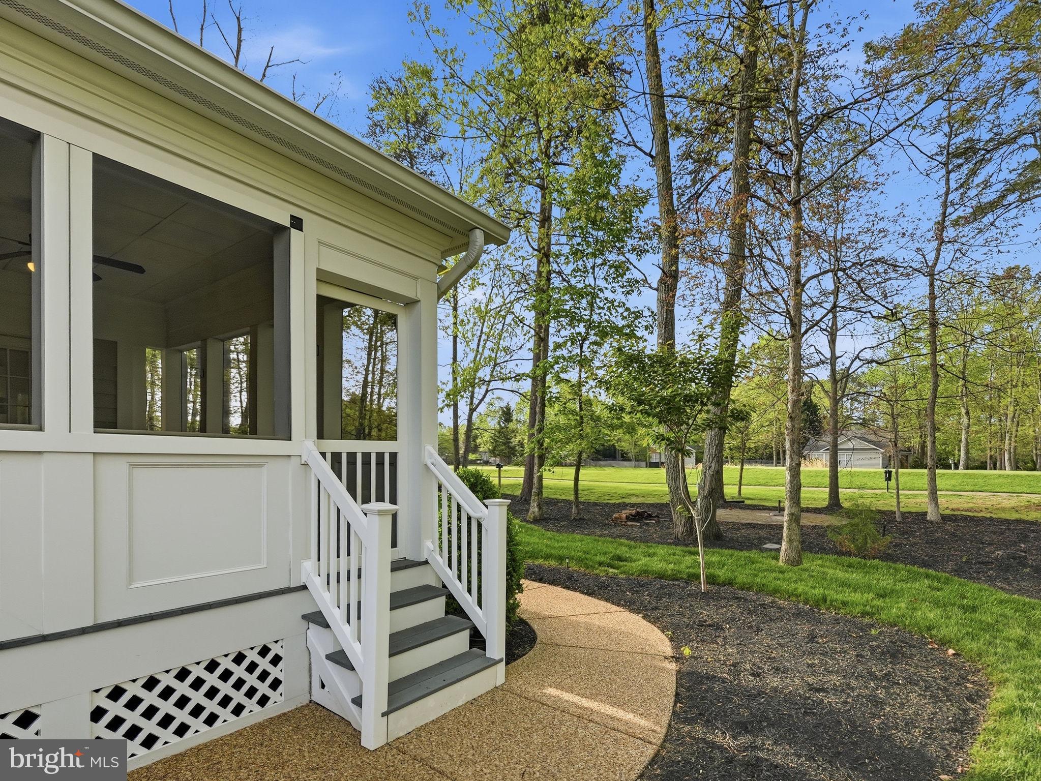 10916 Chatham Ridge Way Spotsylvania, VA 22551 - Photo 65 of 92 Charming porch nestled in nature's embrace.