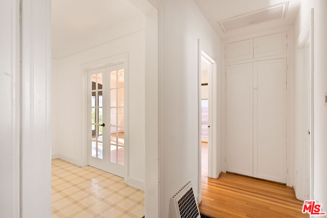 813 North Orange Grove Avenue Los Angeles, CA 90046 - Photo 15 of 42 a view of an empty room and wooden floor