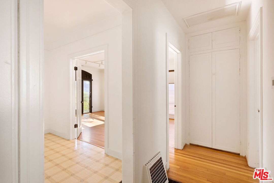 813 North Orange Grove Avenue Los Angeles, CA 90046 - Photo 16 of 42 a bathroom with a toilet and a shower