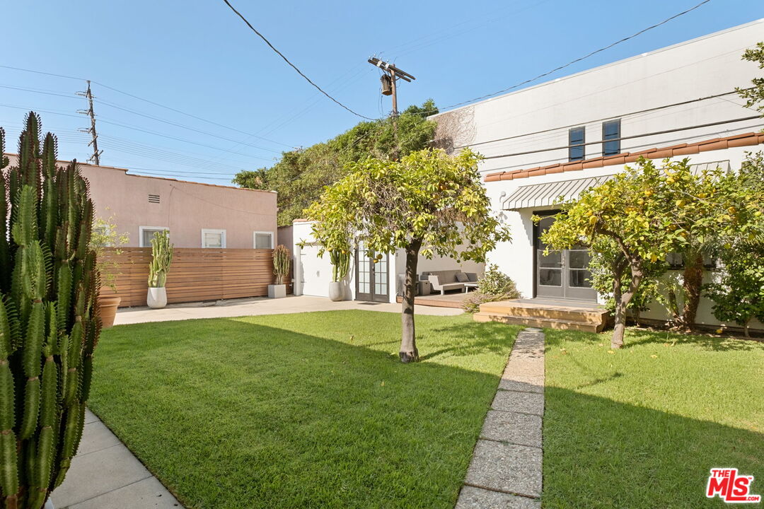 813 North Orange Grove Avenue Los Angeles, CA 90046 - Photo 42 of 42 a view of a house with a yard