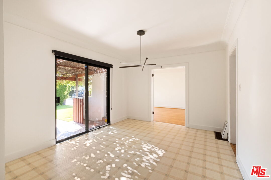 813 North Orange Grove Avenue Los Angeles, CA 90046 - Photo 6 of 42 a view of an empty room with a window