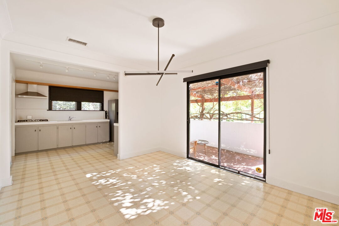 813 North Orange Grove Avenue Los Angeles, CA 90046 - Photo 8 of 42 a view of a room with a sink and cabinet