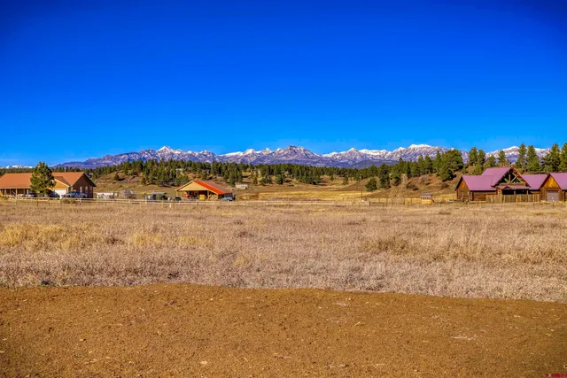 a view of a lake with a houses