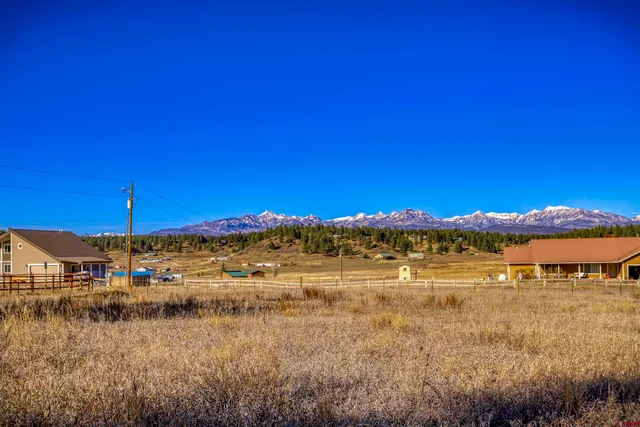 a view of lake with mountain
