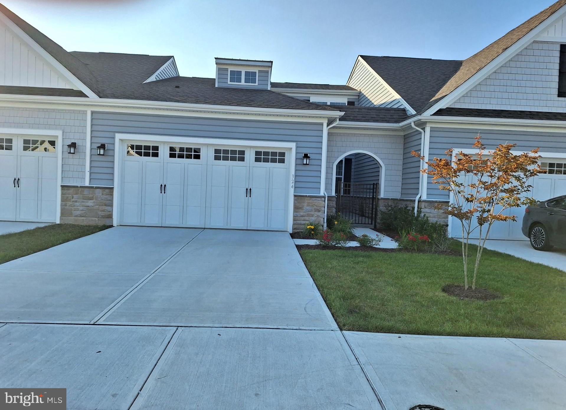 324 Moorings Circle, Unit 108 Stevensville, MD 21666 - Photo 1 of 30 a view of a house with a yard