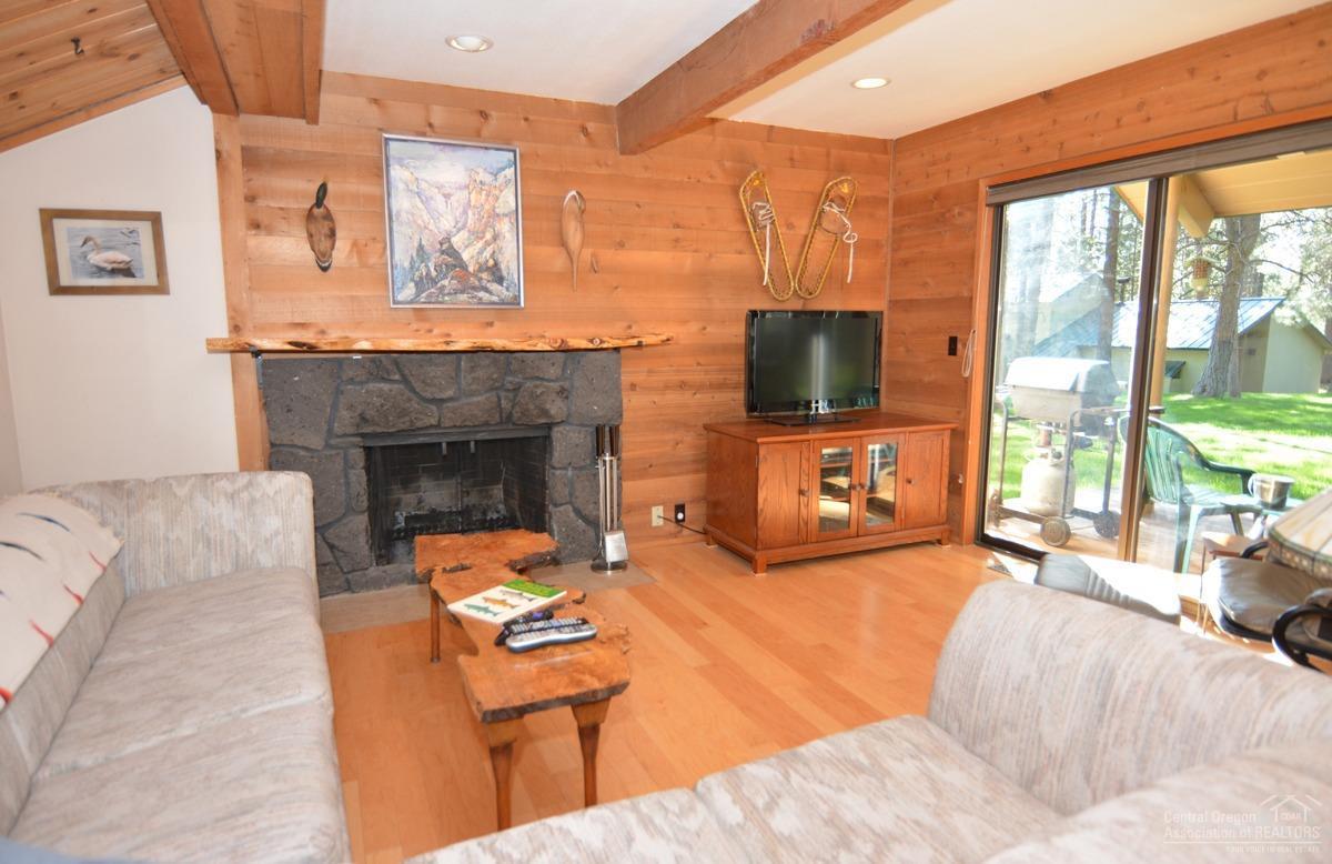 57515 Ranch Cabin Road, Unit B15 Sunriver, OR 97707 - Photo 9 of 21 Wood burning stone fireplace for apres s