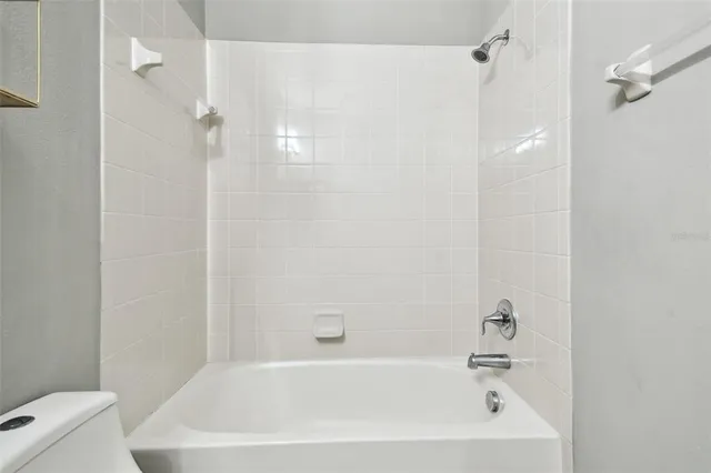 an aerial view of a house with a ocean view