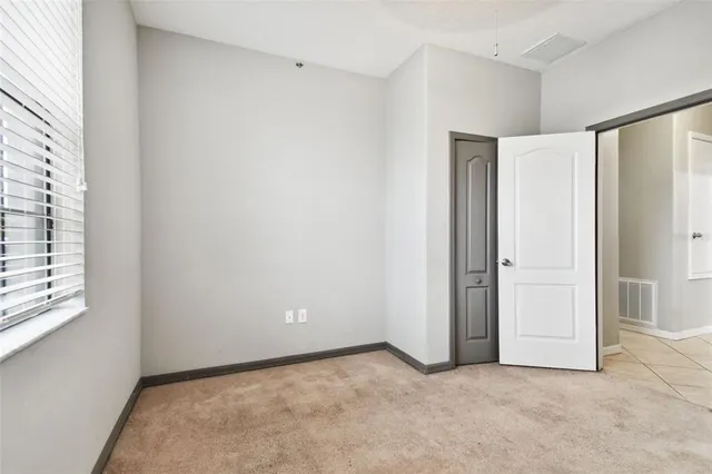 an aerial view of a house with swimming pool