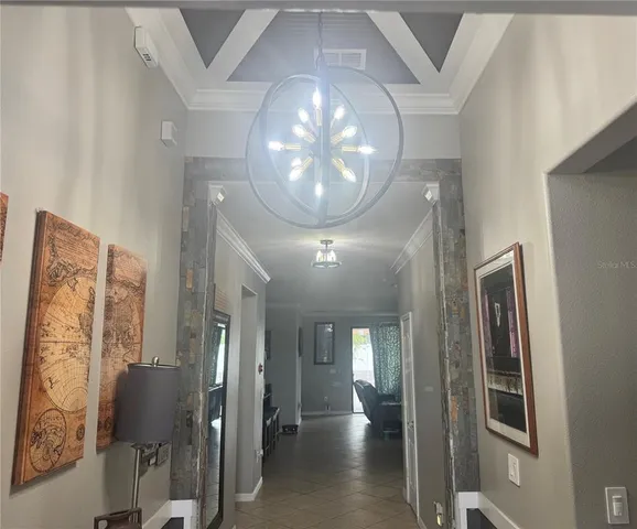 a kitchen with granite countertop a sink stainless steel appliances and cabinets