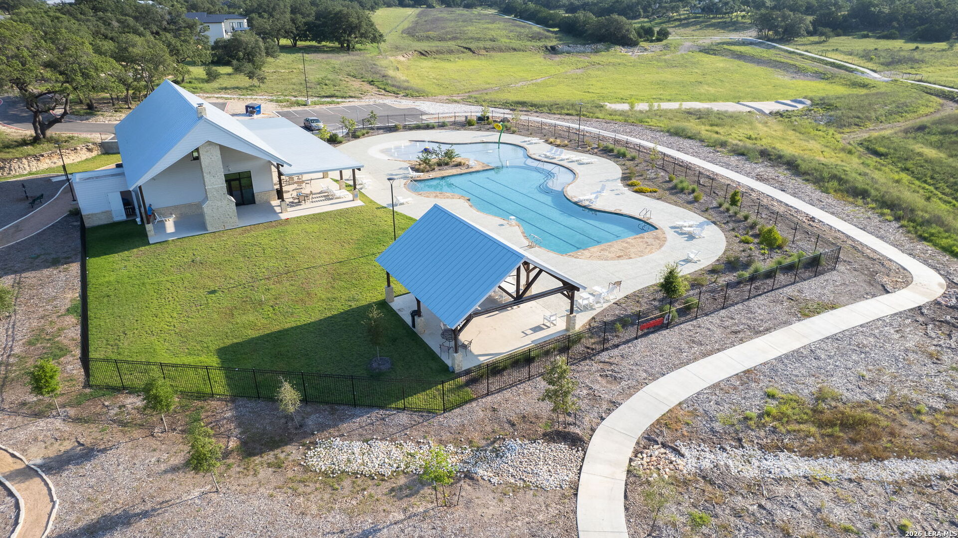 34780 Ansley Rdg Trail Bulverde, TX 78163 - Photo 12 of 14 an aerial view of a house with a yard basket ball court and outdoor seating
