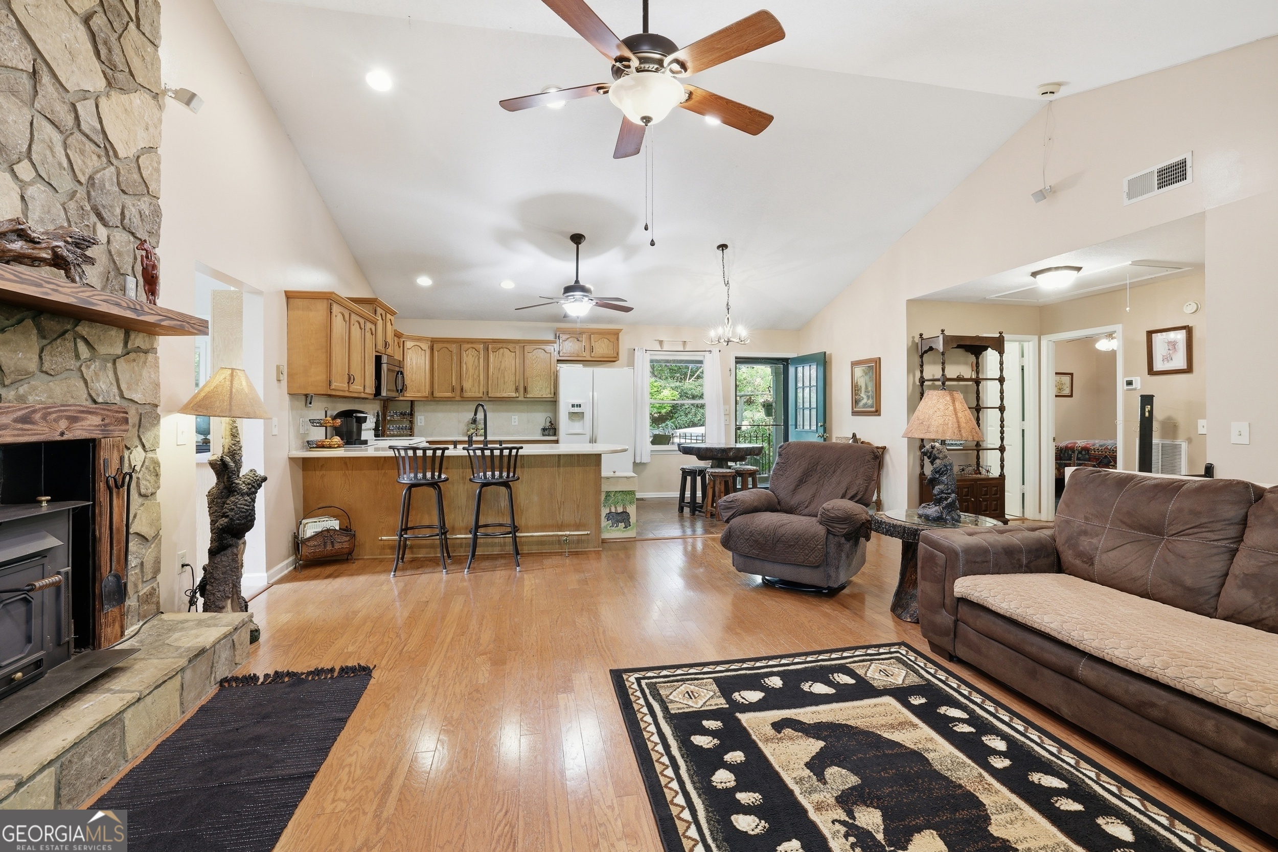 584 Battle Branch Vista Road Franklin, NC 28734 - Photo 11 of 46 a living room with furniture and a fireplace