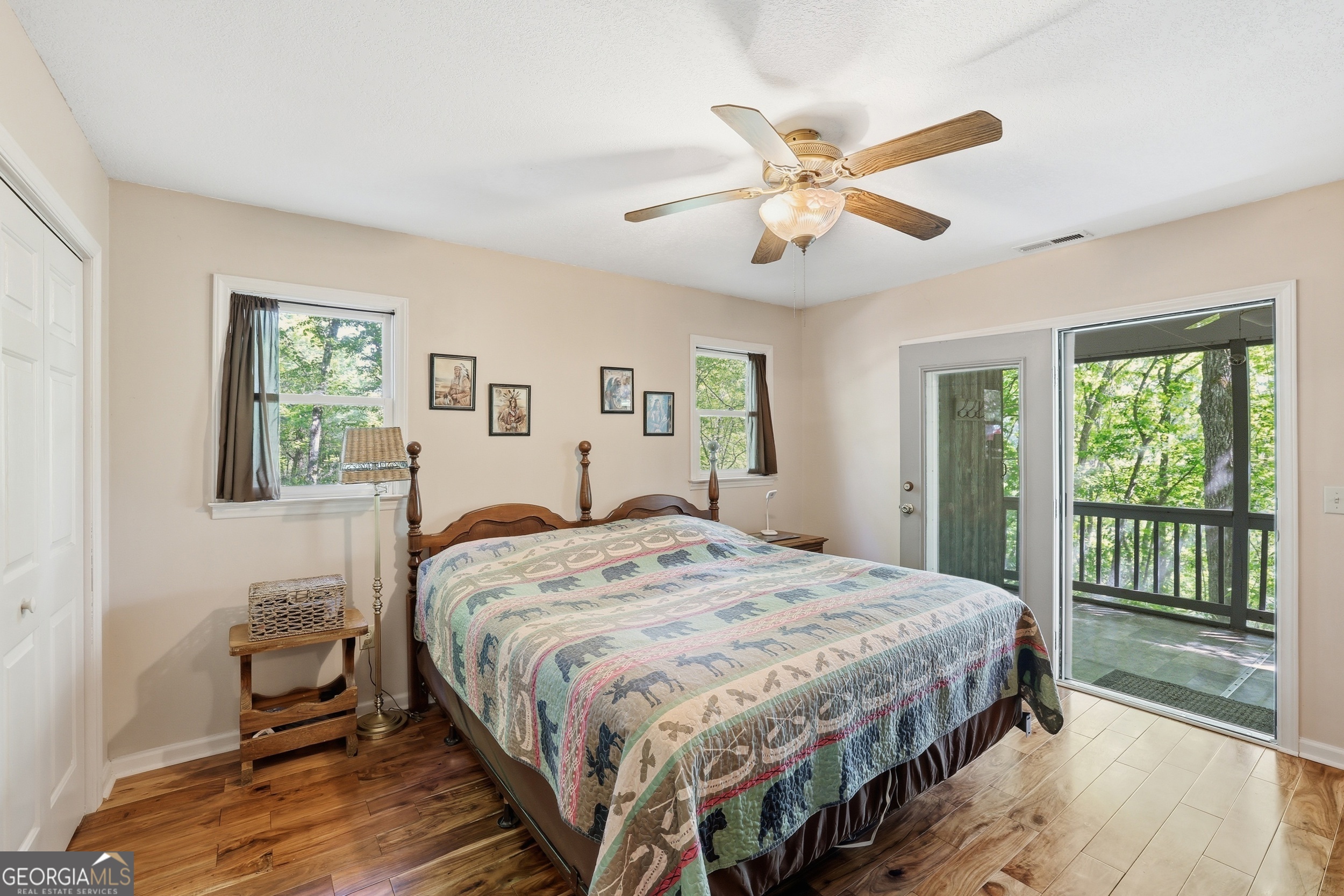 584 Battle Branch Vista Road Franklin, NC 28734 - Photo 20 of 46 a bedroom with a bed and a large window