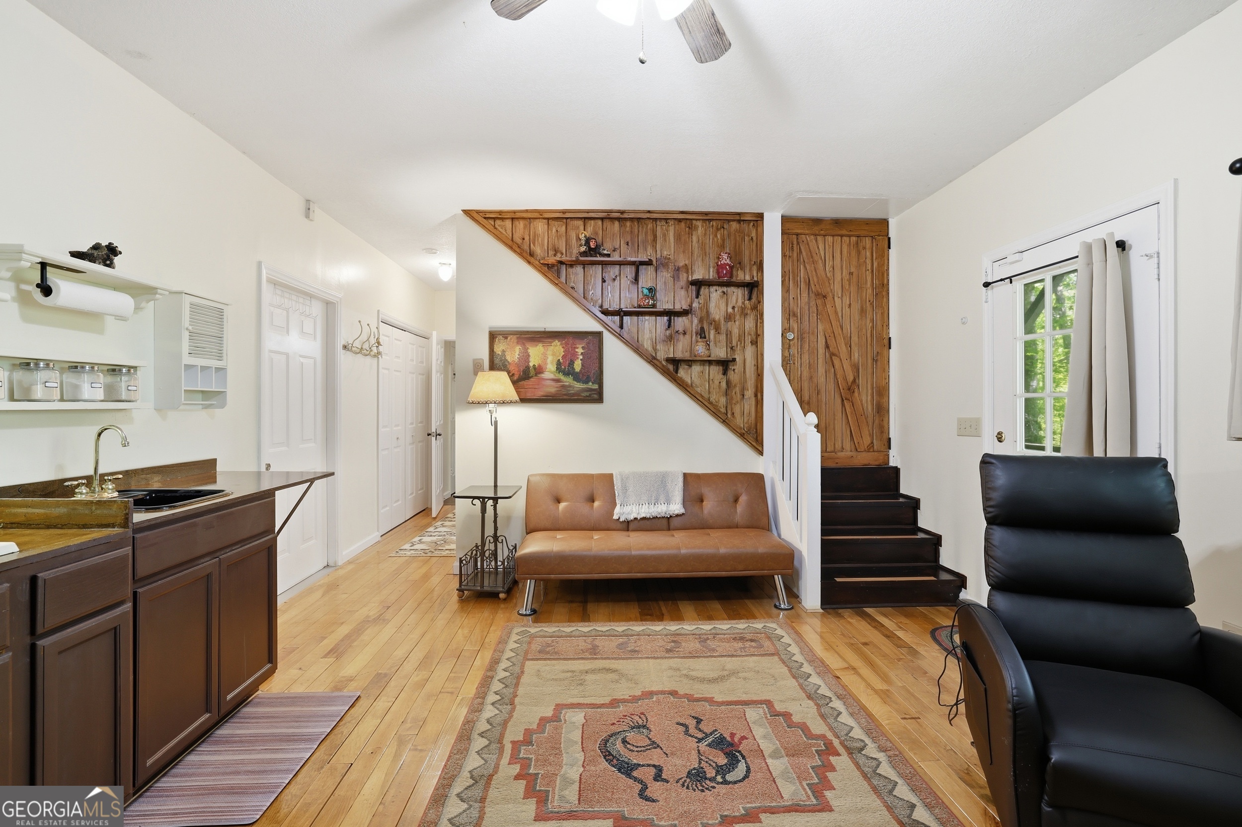 584 Battle Branch Vista Road Franklin, NC 28734 - Photo 25 of 46 a living room with furniture and wooden floor