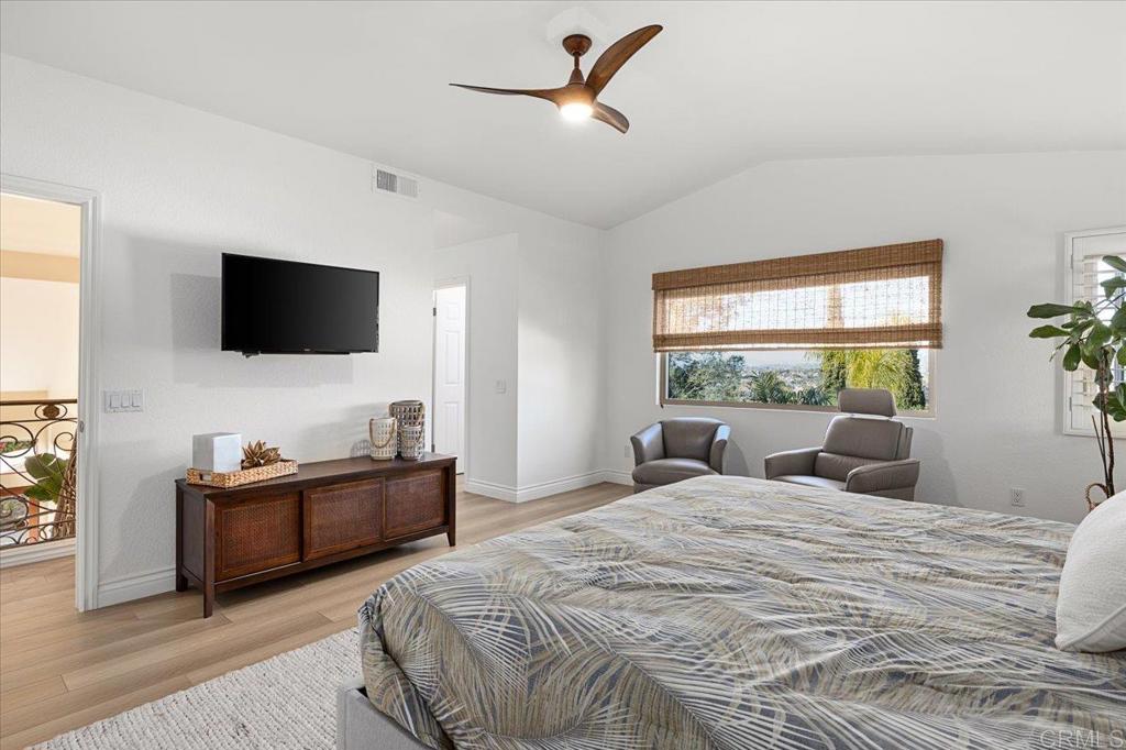1832 Avenida Flores Encinitas, CA 92024 - Photo 41 of 72 a bedroom with a bed and a flat screen tv