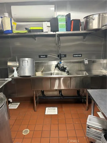 a bathroom with a walk in closet