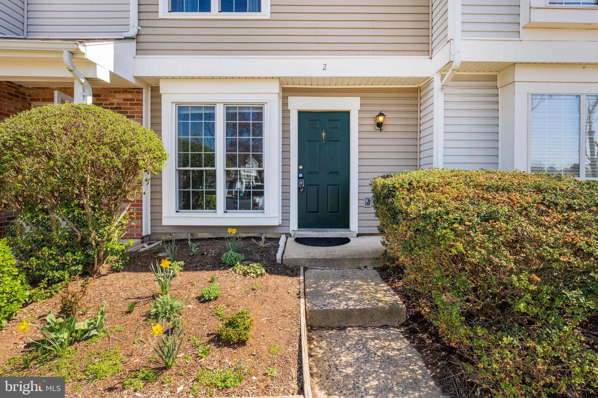 2 Providence Square Sterling, VA 20164 - Photo 3 of 30 Perennial flowers are starting to bloom.