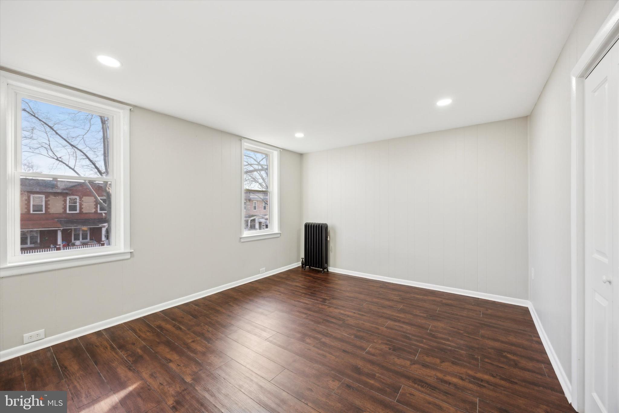 147 7th Avenue Roebling, NJ 08554 - Photo 12 of 13 a view of an empty room with wooden floor and a window