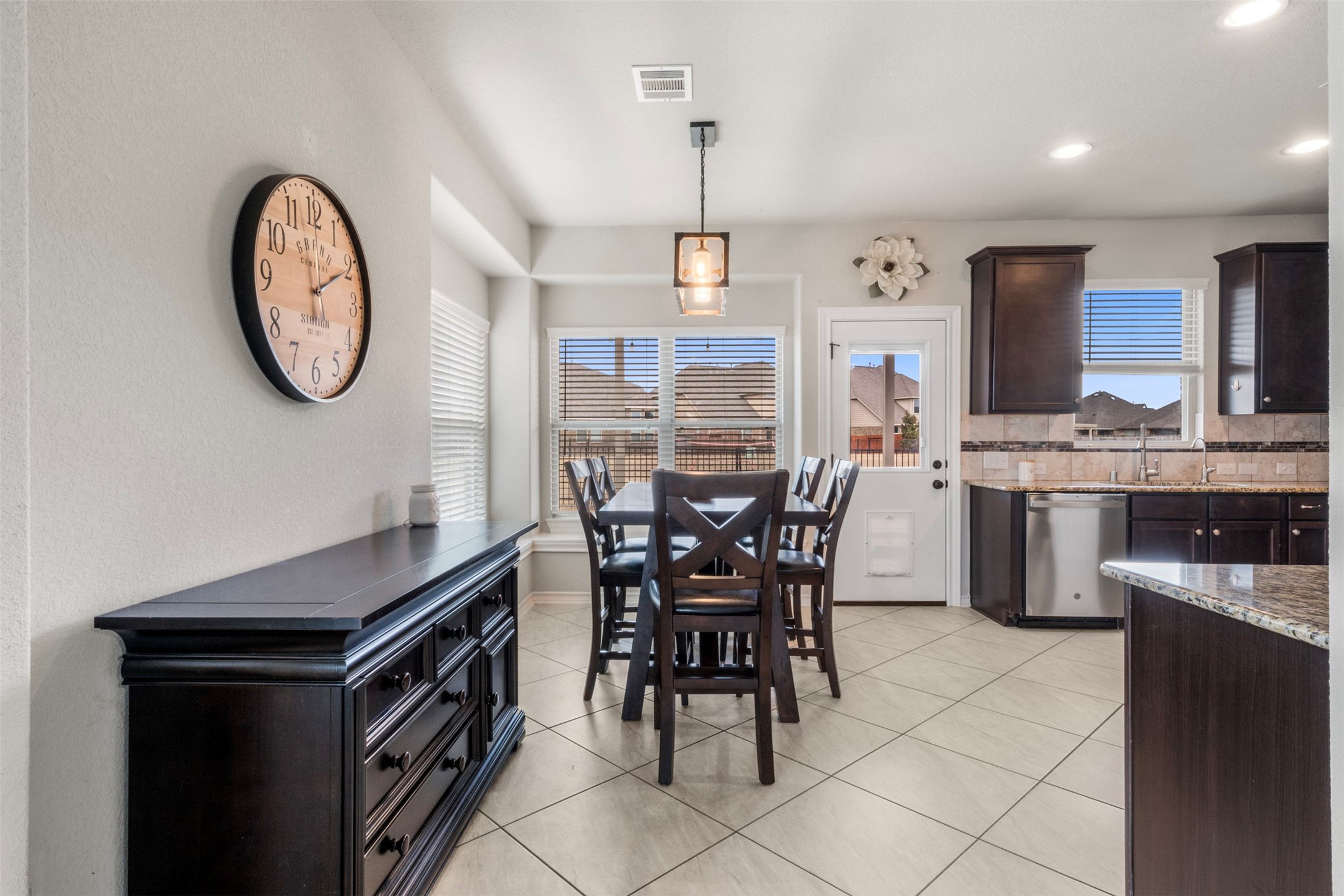 6210 Mason Way Rosenberg, TX 77471 - Photo 15 of 31 a view of a kitchen with a dining table and chairs