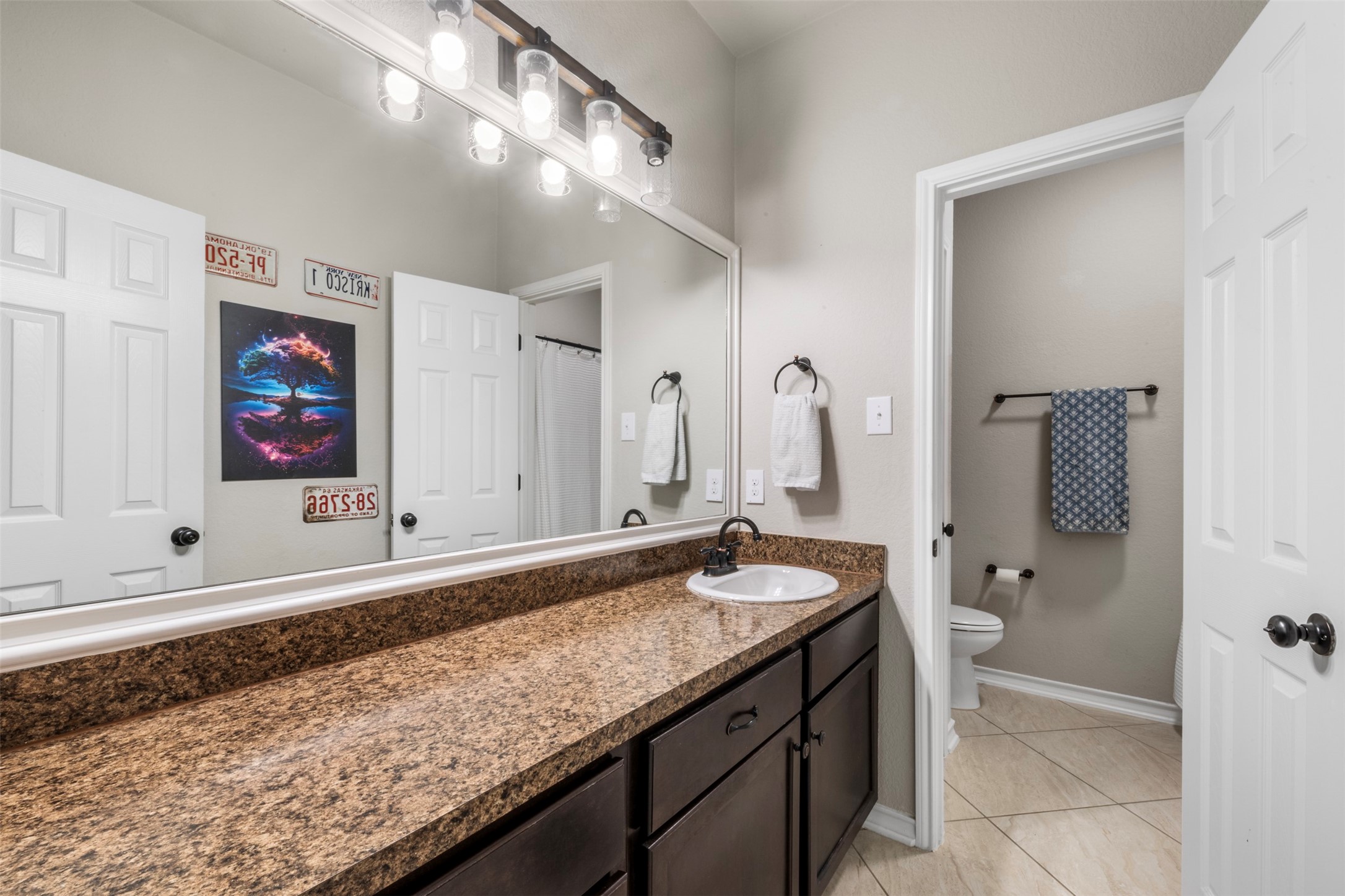 6210 Mason Way Rosenberg, TX 77471 - Photo 22 of 31 a bathroom with a granite countertop sink and a mirror