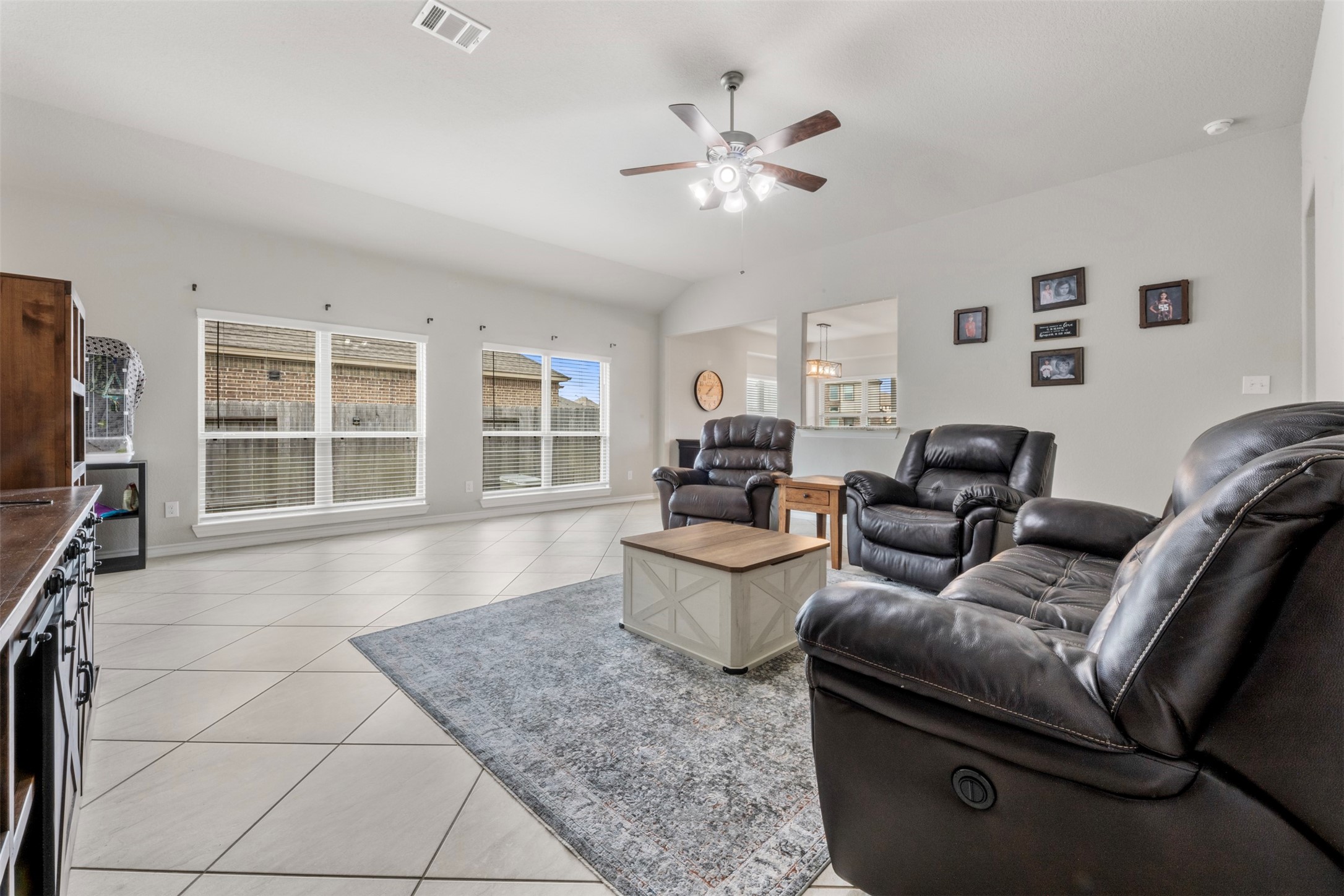 6210 Mason Way Rosenberg, TX 77471 - Photo 9 of 31 a living room with furniture and a flat screen tv