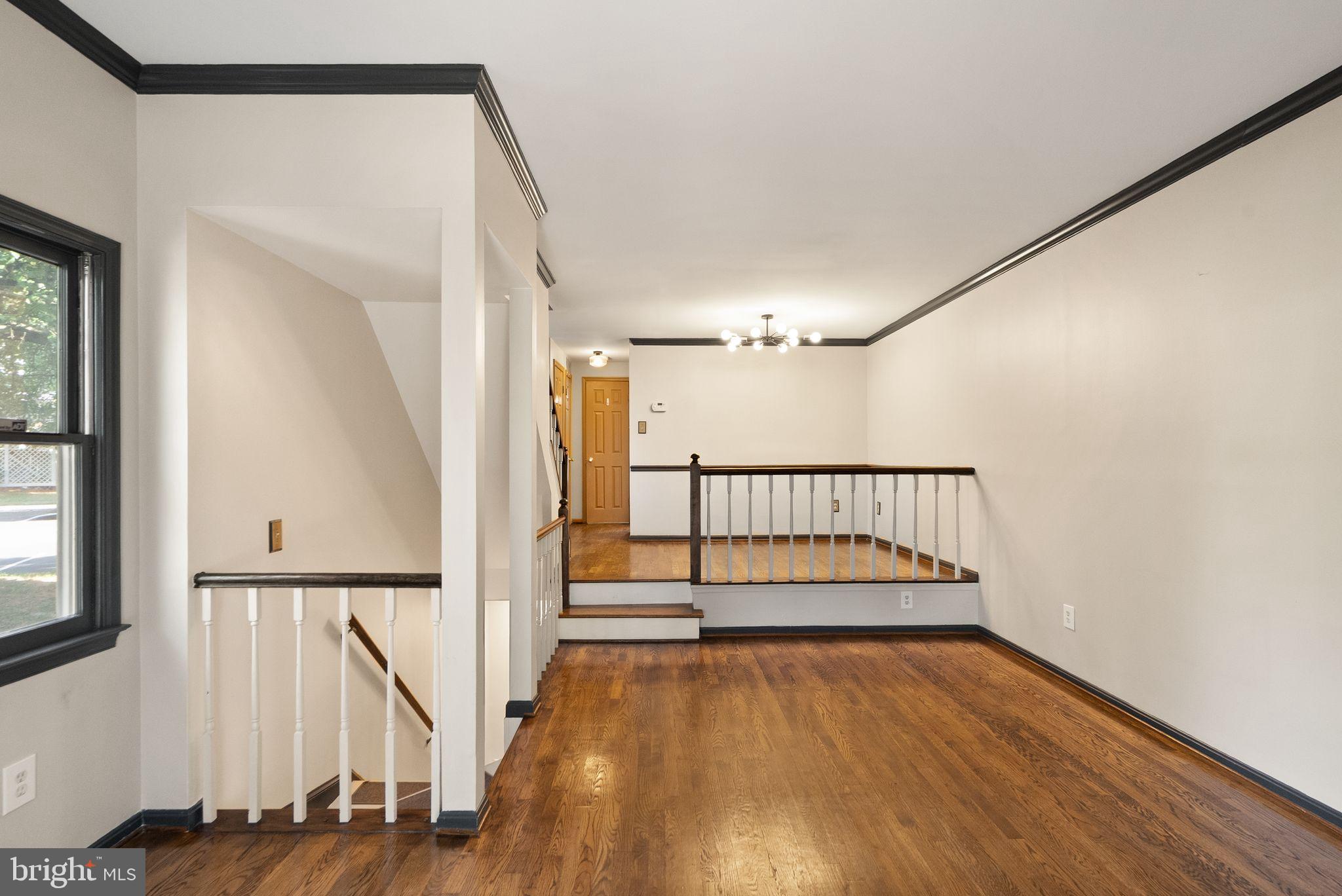 1700 Quietree Drive Reston, VA 20194 - Photo 18 of 76 Family Room & Dining combo with Fireplace