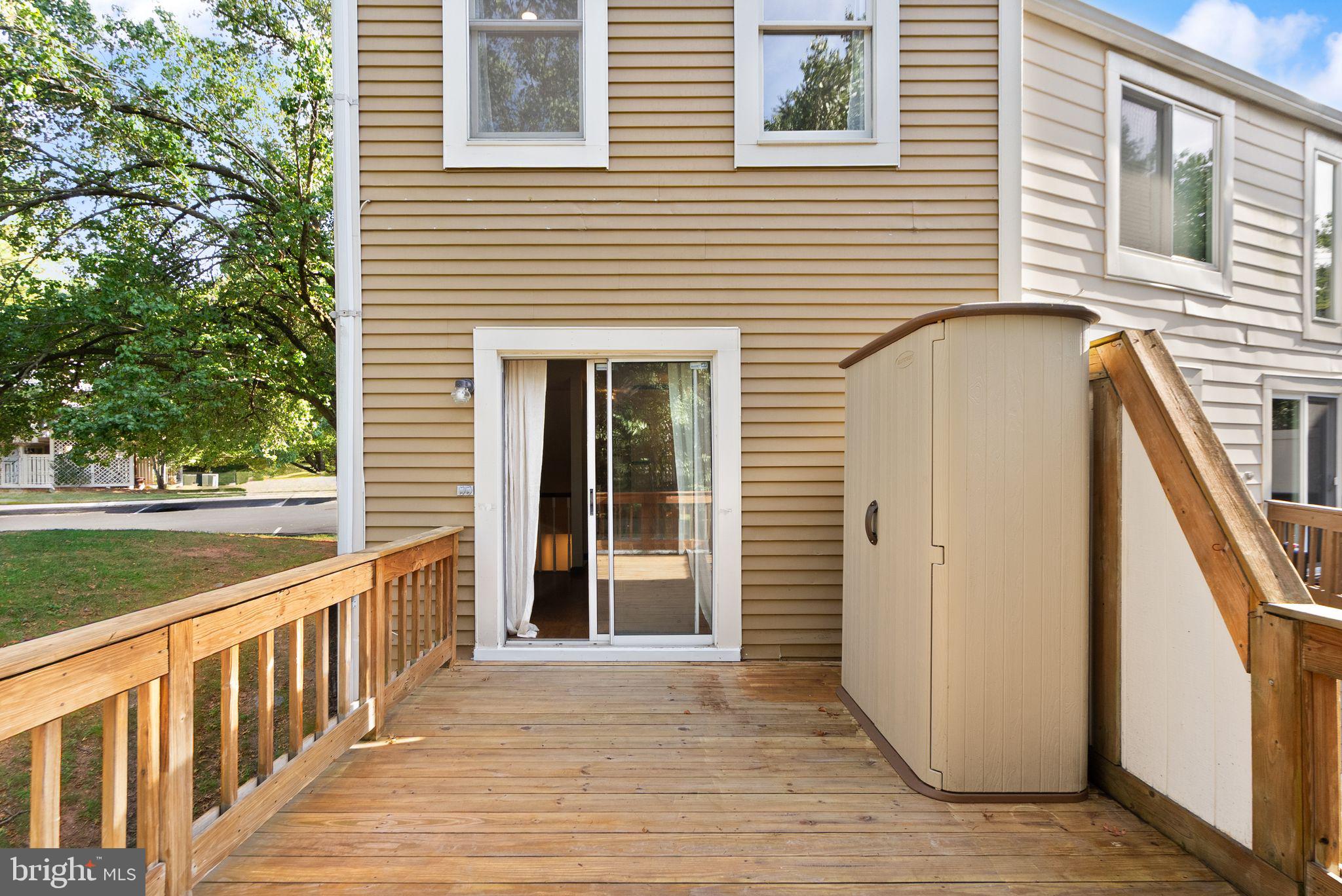 1700 Quietree Drive Reston, VA 20194 - Photo 26 of 76 a view of a house with deck