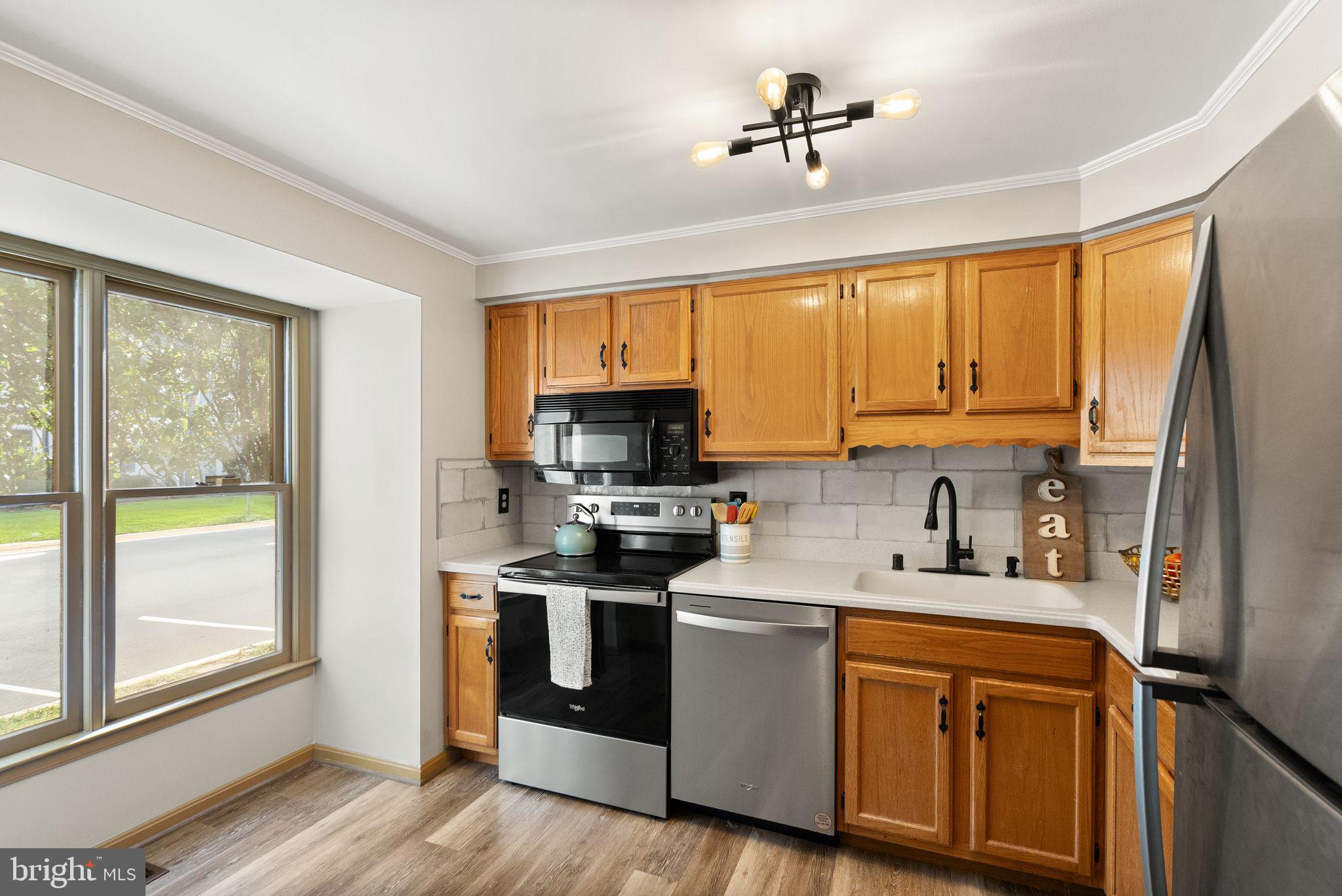 1700 Quietree Drive Reston, VA 20194 - Photo 27 of 76 Kitchen with Stainless Steel Appliances