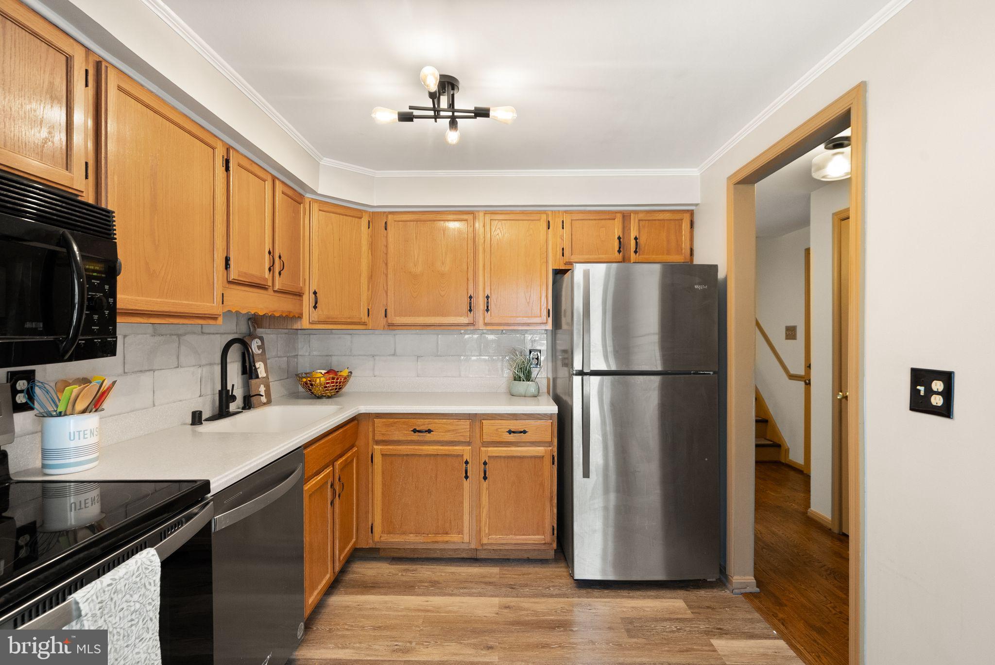 1700 Quietree Drive Reston, VA 20194 - Photo 30 of 76 Kitchen with Stainless Steel Appliances