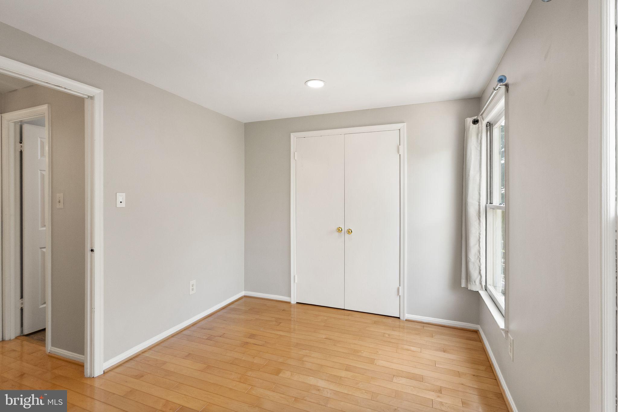 1700 Quietree Drive Reston, VA 20194 - Photo 46 of 76 a view of an empty room and window