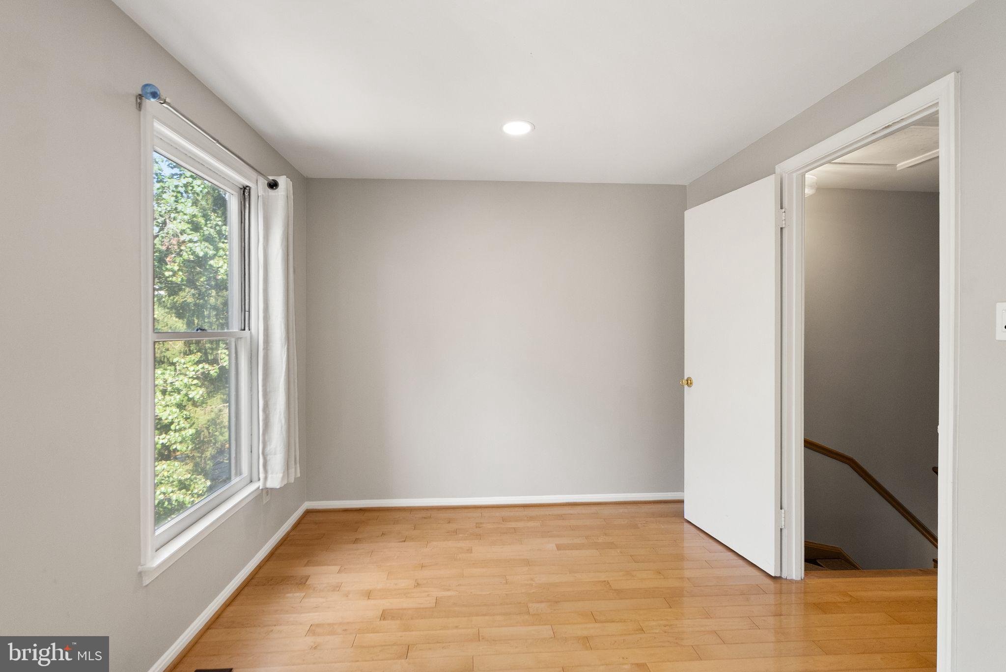 1700 Quietree Drive Reston, VA 20194 - Photo 47 of 76 a view of an empty room with a window