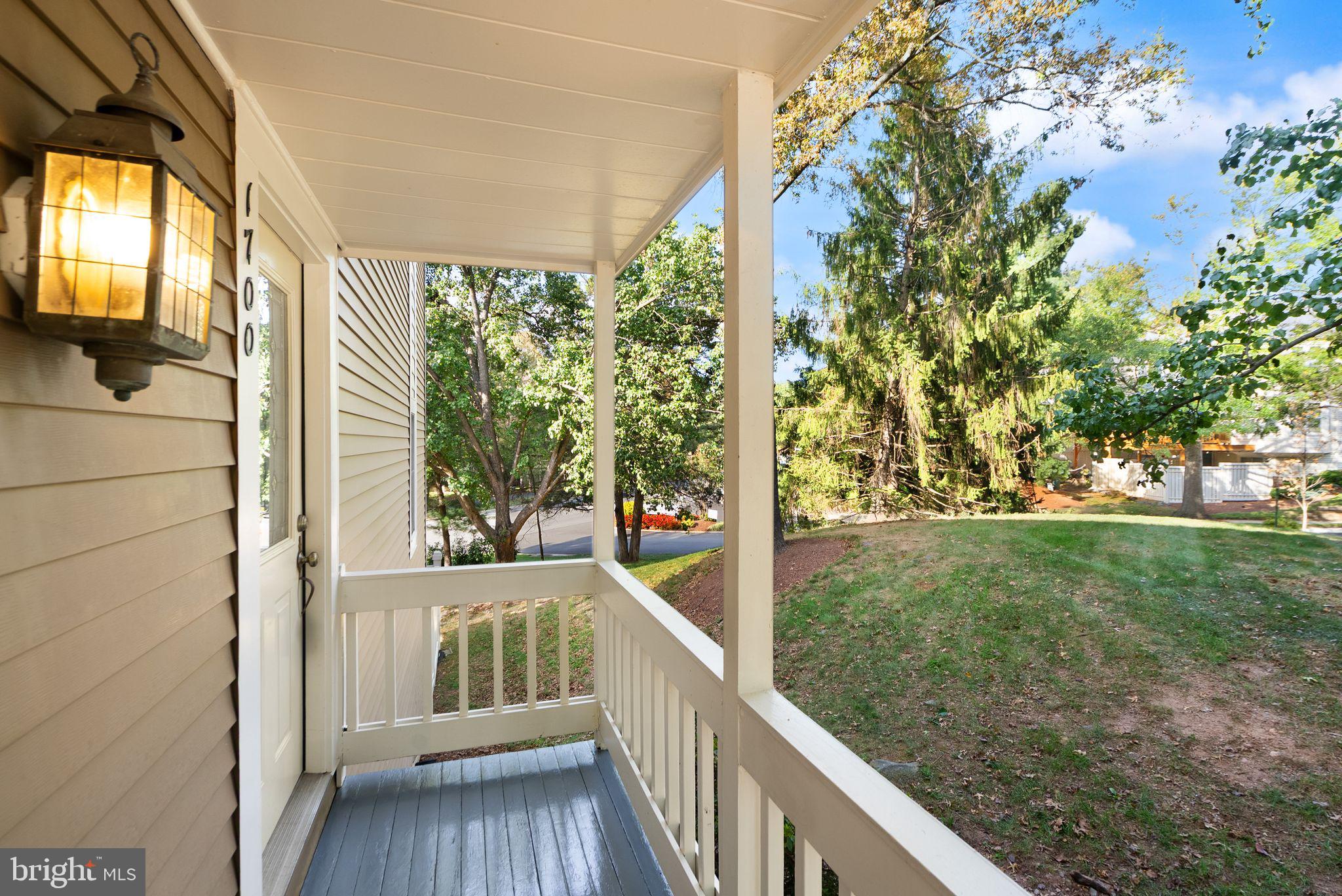 1700 Quietree Drive Reston, VA 20194 - Photo 6 of 76 a view of balcony with garden