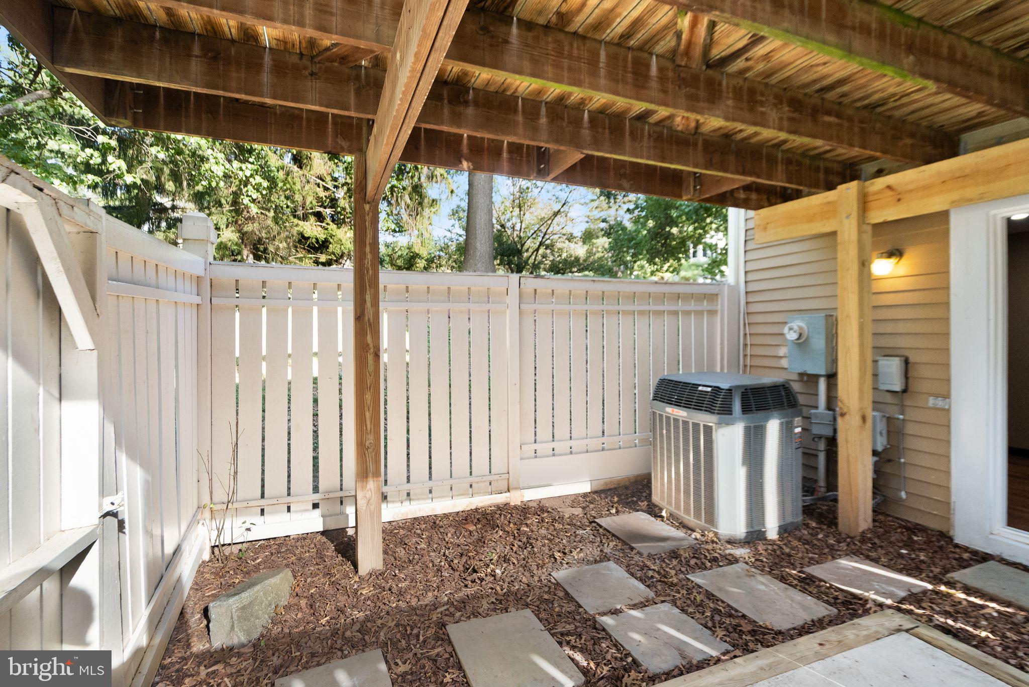 1700 Quietree Drive Reston, VA 20194 - Photo 68 of 76 a view of a small house with backyard