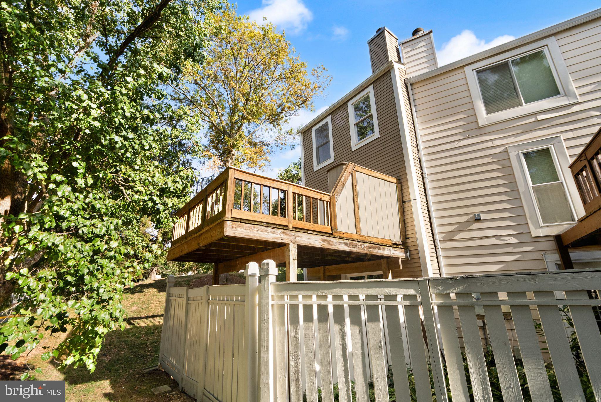 1700 Quietree Drive Reston, VA 20194 - Photo 70 of 76 a view of a house with a small yard