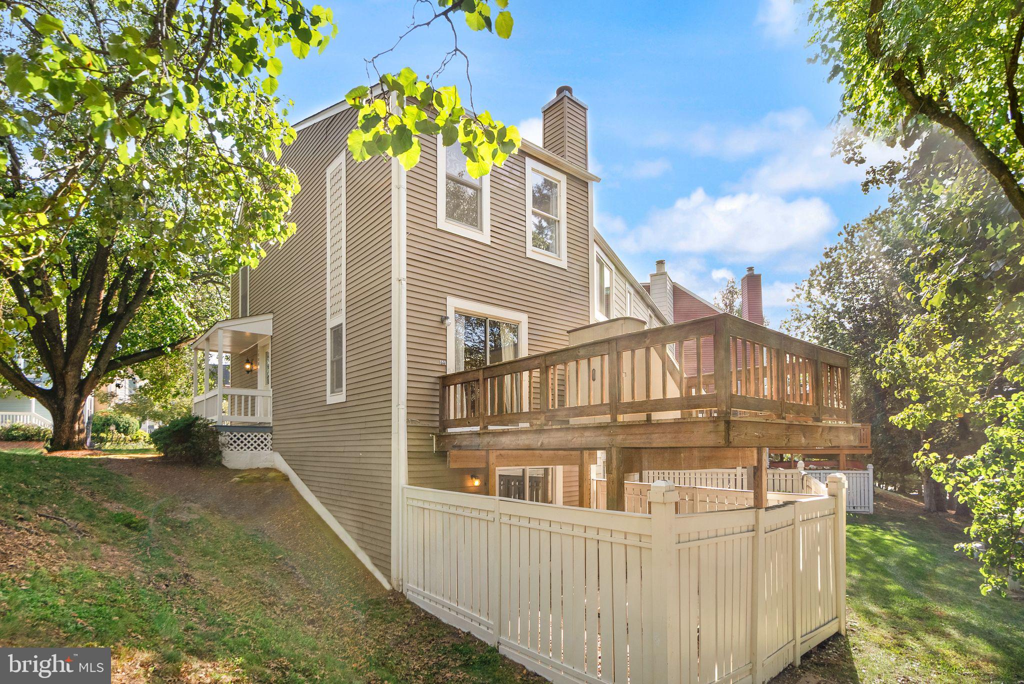 1700 Quietree Drive Reston, VA 20194 - Photo 72 of 76 a front view of a house with a yard