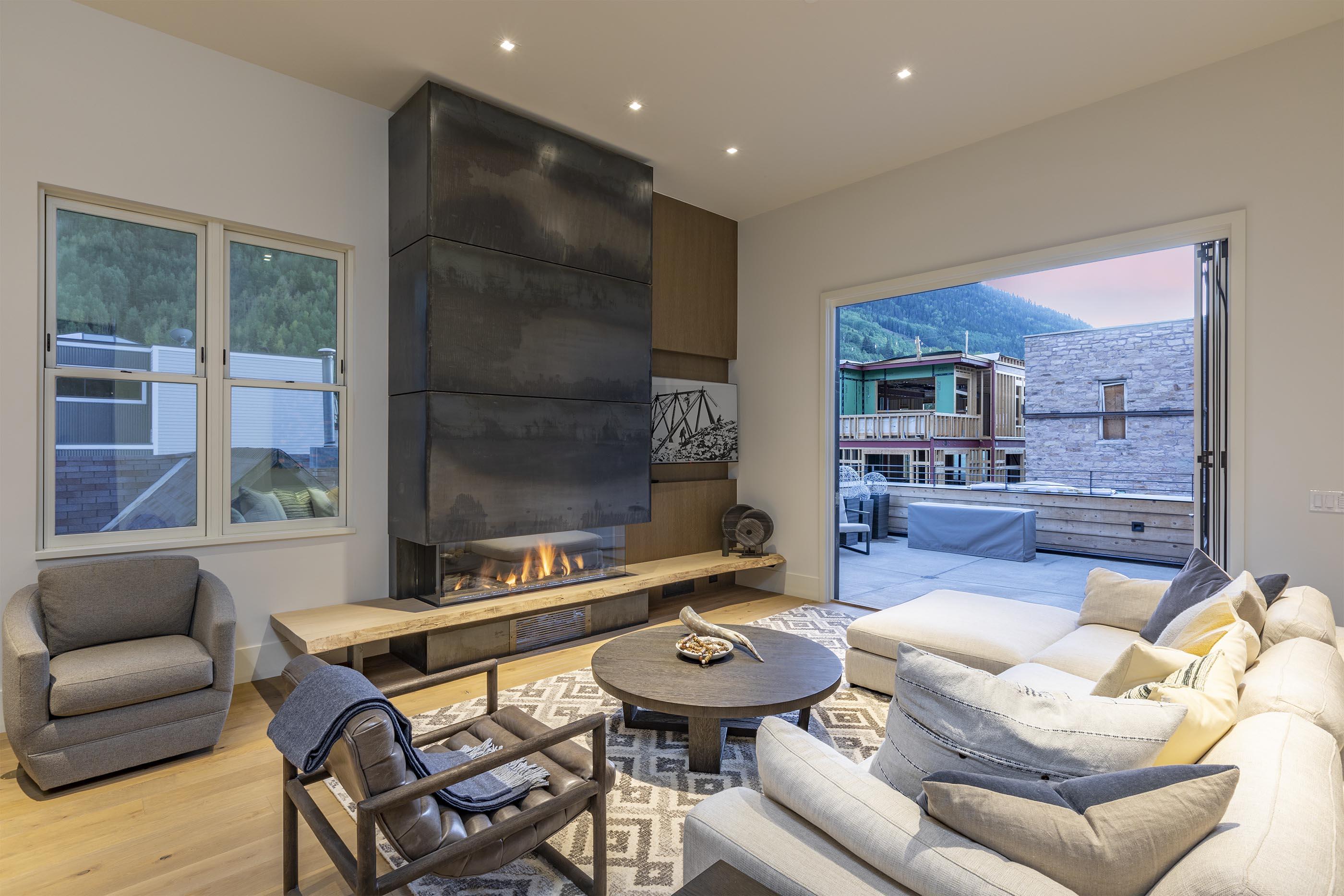 201 South Fir Street, Unit 4 Telluride, CO 81435 - Photo 7 of 10 a living room with furniture and a large window