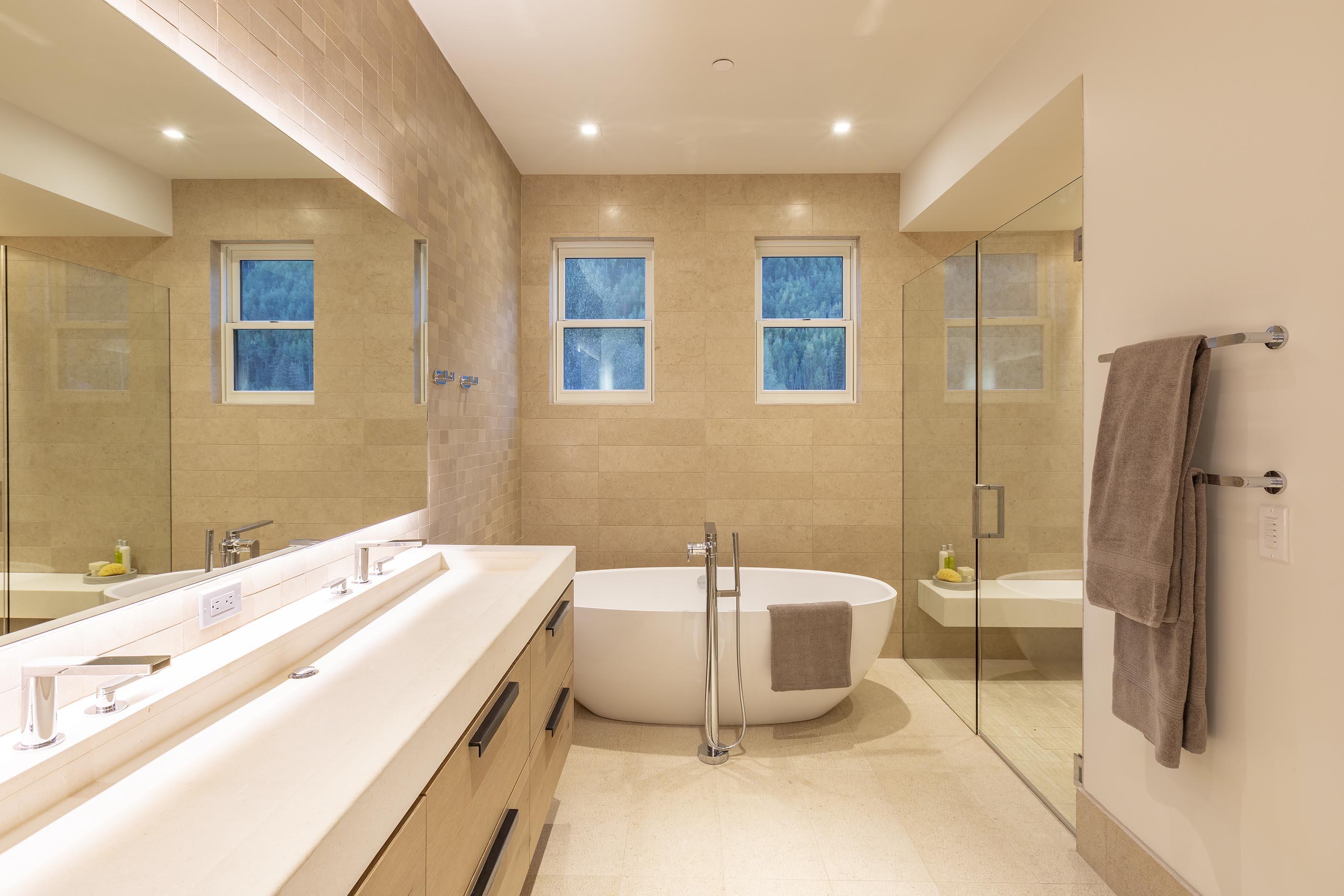 201 South Fir Street, Unit 4 Telluride, CO 81435 - Photo 9 of 10 a bathroom with a tub sink and shower