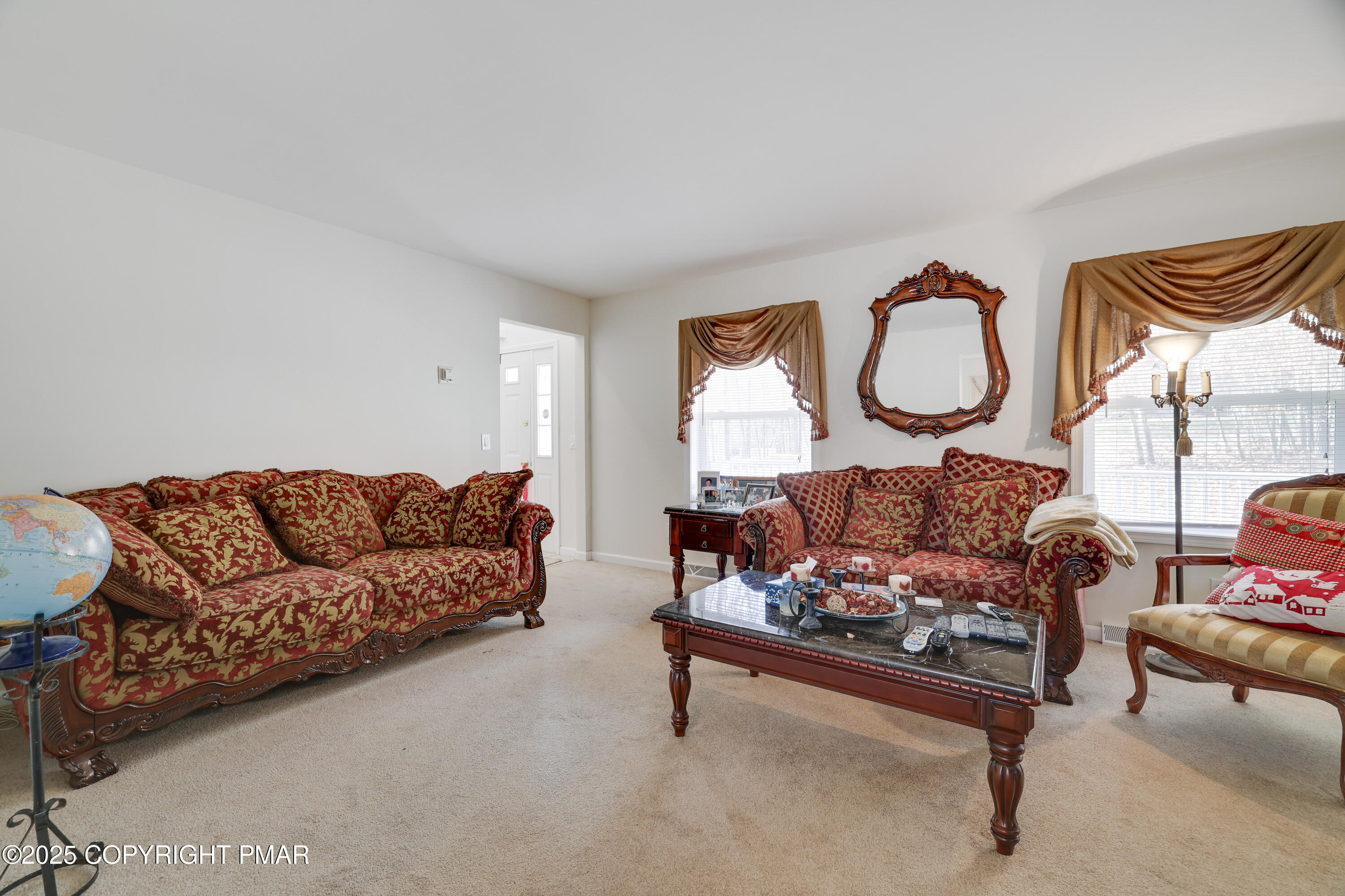138 Jennifer Lane Effort, PA 18330 - Photo 18 of 41 a living room with furniture and a large window